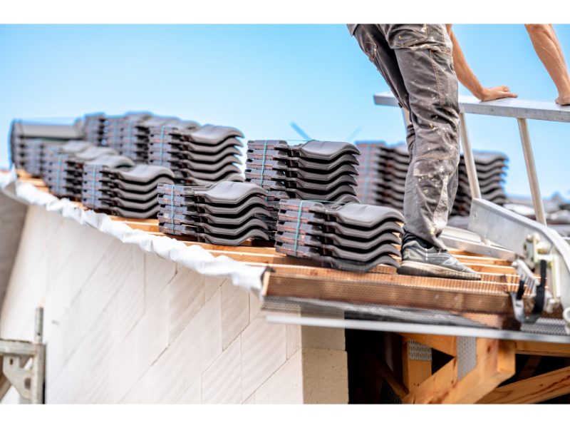 Roof tiles staged for installation on a residential roof